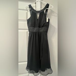 Black dress. Great for holiday parties. Size 4. NWT WHBM.